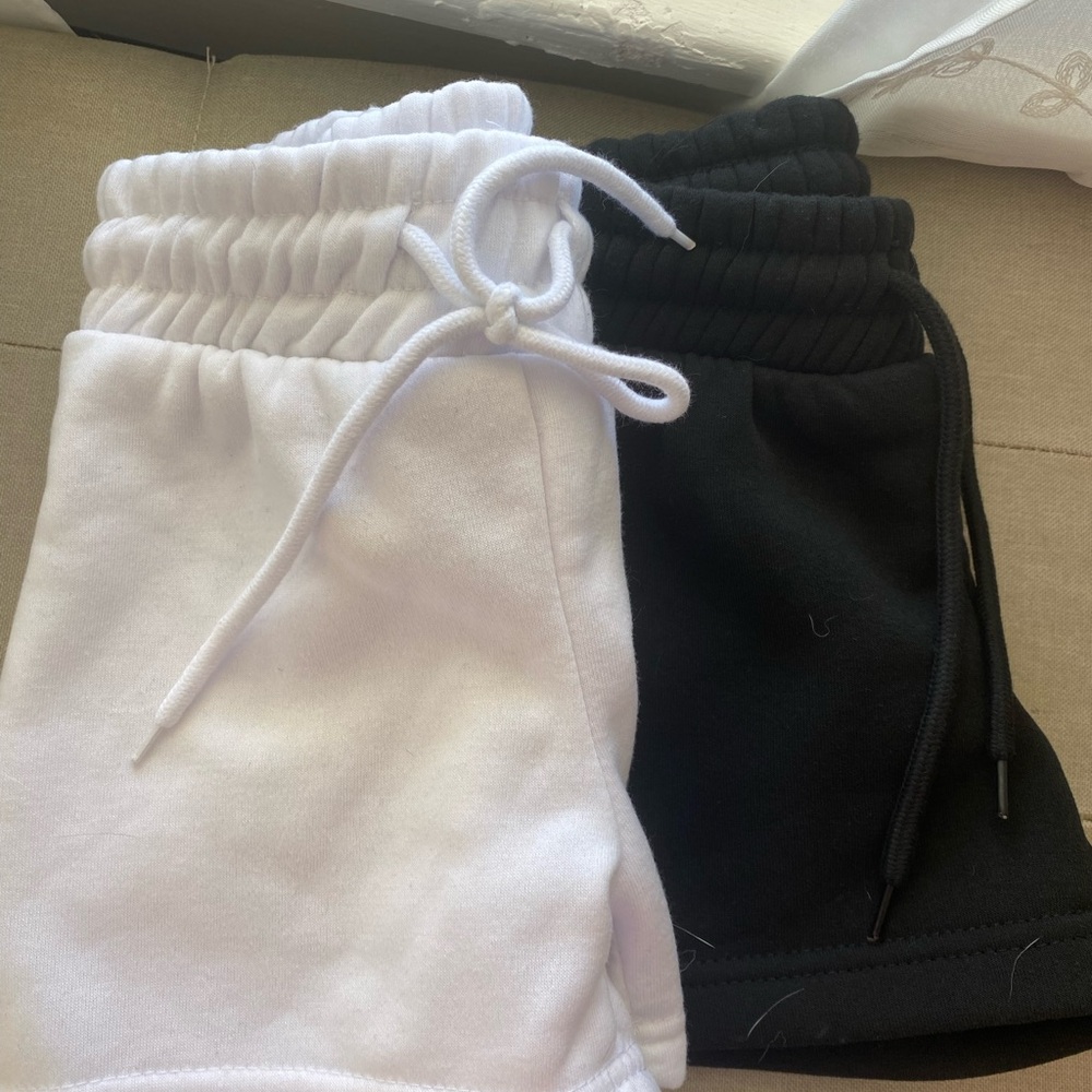 Matching black and white sweat shirt set